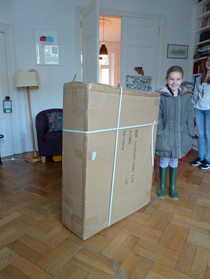 The box next to a nine year old (who hasn't been told she might be fitted into it)